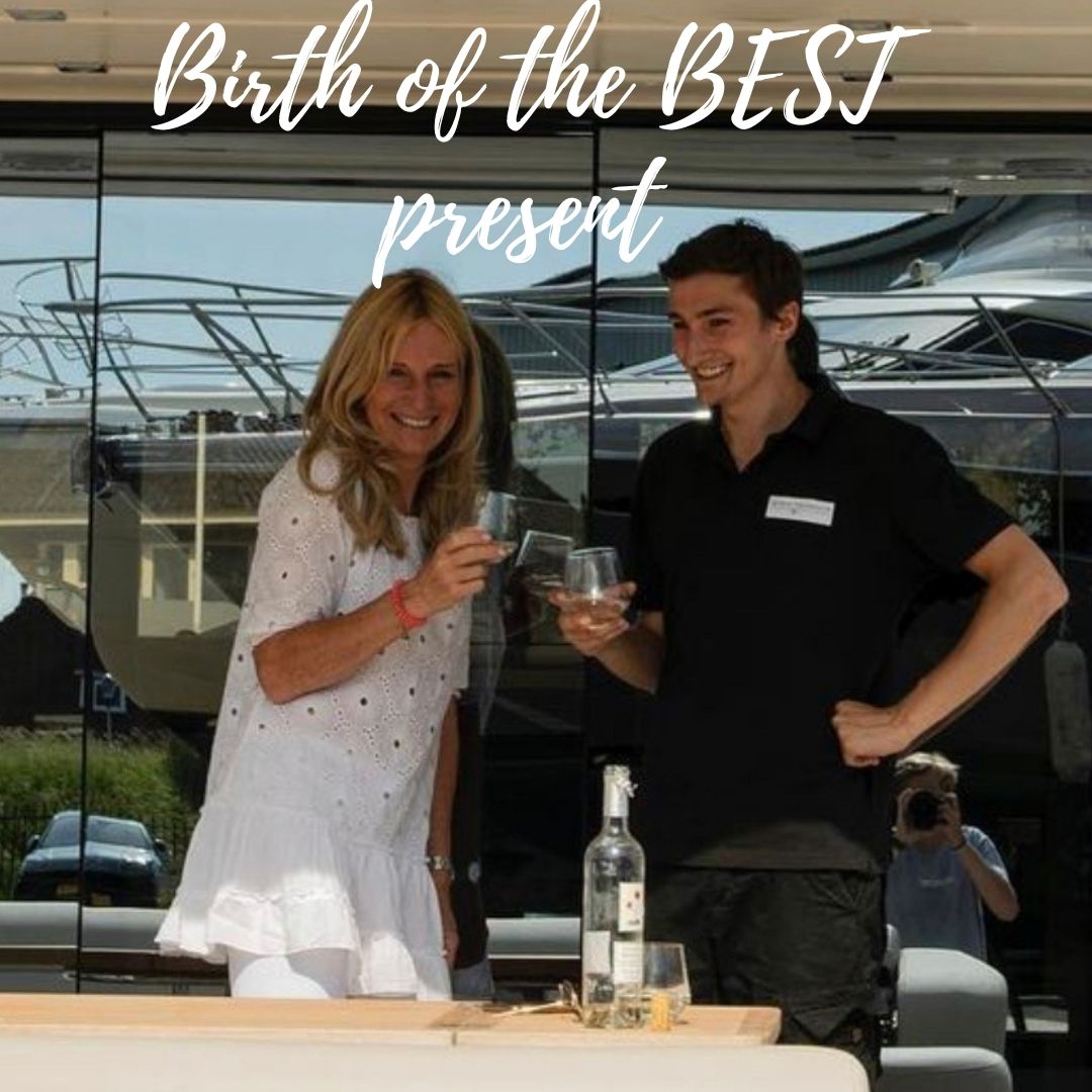 Image of a woman and a man toasting to the birth of the best present